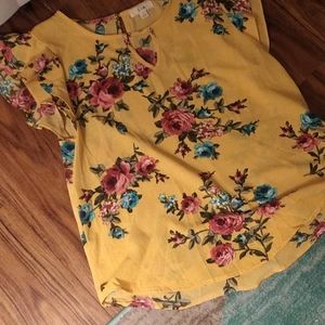 Women's yellow shirt with roses and flowers